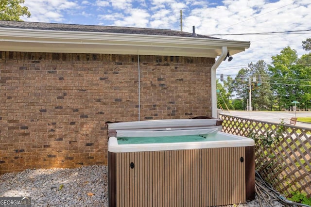 3642 S Bogan Rd, Buford, GA 30519 - view of patio / terrace featuring a hot tub