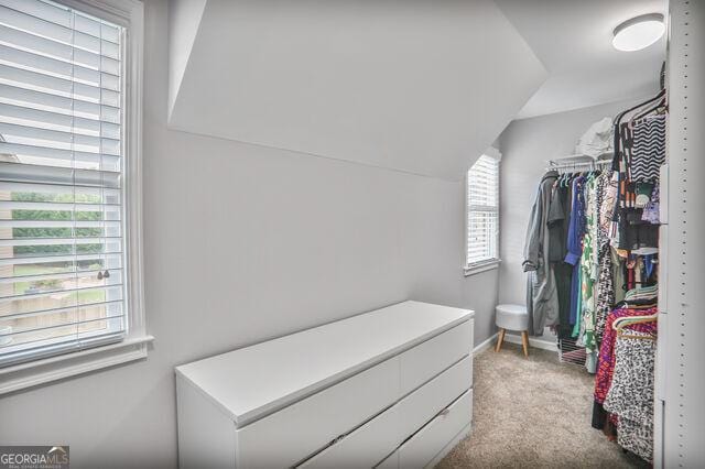 4818 Moon Hollow Ct, Buford, GA 30519 - spacious closet with carpet flooring and lofted ceiling