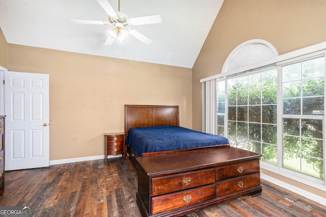 1478 Elena Dr, Mcdonough, GA 30253 - bedroom with dark wood-type flooring, vaulted ceiling, multiple windows, and a ceiling fan
