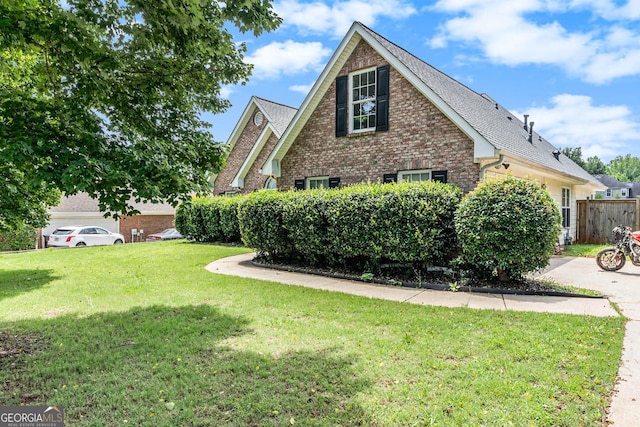 1478 Elena Dr, Mcdonough, GA 30253 - view of home's exterior featuring brick siding and roof with shingles
