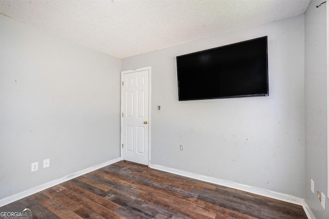 1478 Elena Dr, Mcdonough, GA 30253 - empty room with hardwood / wood-style flooring and a textured ceiling