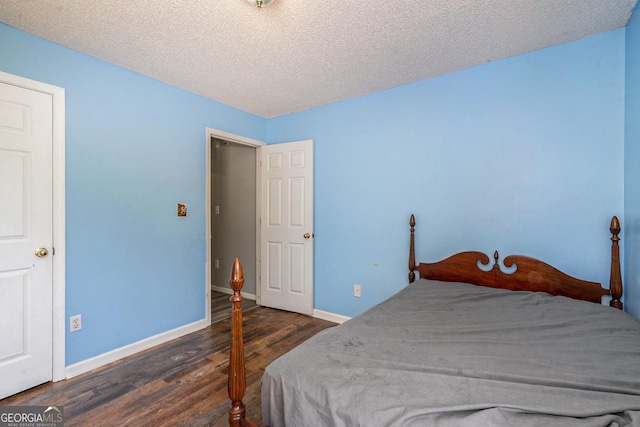 1478 Elena Dr, Mcdonough, GA 30253 - bedroom featuring wood finished floors and a textured ceiling