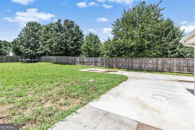 1478 Elena Dr, Mcdonough, GA 30253 - fenced backyard featuring a trampoline and a patio