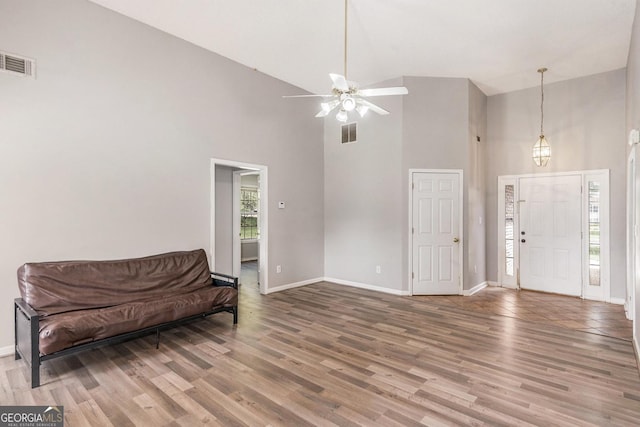 1478 Elena Dr, Mcdonough, GA 30253 - entryway featuring high vaulted ceiling, ceiling fan, and wood finished floors