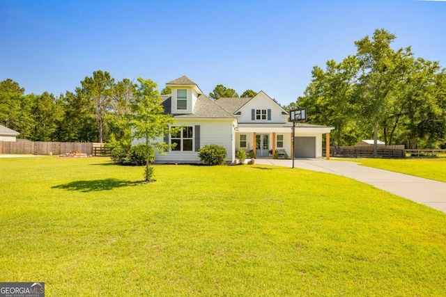 204 Dean Dr, Guyton, GA 31312 - view of front facade with an attached garage, driveway, and roof with shingles