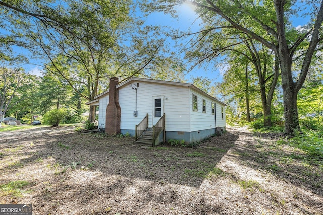 117 Chester Harris Dr, Dallas, GA 30132 - view of side of property with entry steps, crawl space, and a chimney