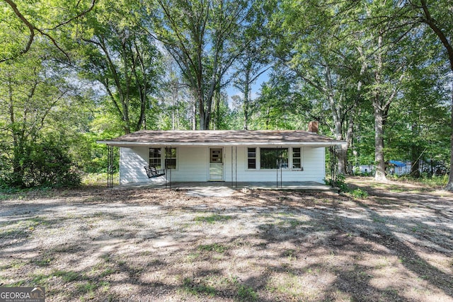117 Chester Harris Dr, Dallas, GA 30132 - single story home with a porch and a chimney
