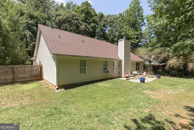 5533 Rose Ridge Ct, Flowery Branch, GA 30542 - rear view of house featuring a patio, a chimney, and roof with shingles