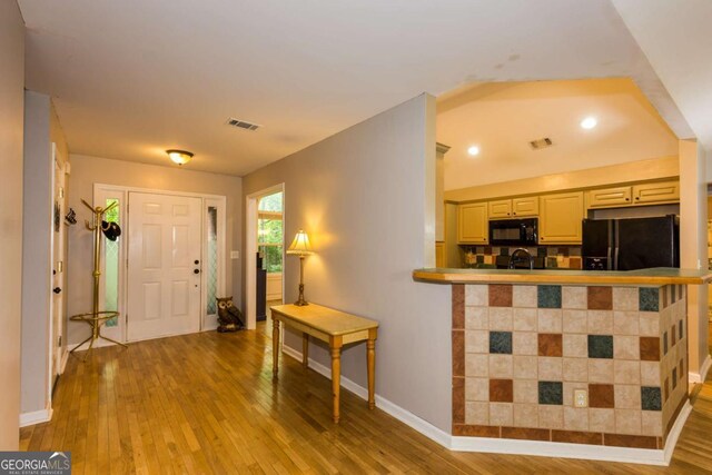 5533 Rose Ridge Ct, Flowery Branch, GA 30542 - entryway with hardwood / wood-style floors, baseboards, and recessed lighting