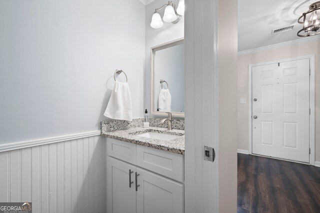 1223 Whitlock Ridge Dr SW, Marietta, GA 30064 - bathroom with ornamental molding, vanity, wood finished floors, and a chandelier