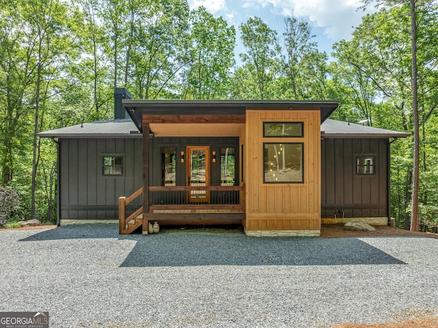 221 Goldmine Rd, Morganton, GA 30560 - view of front of house featuring metal roof, board and batten siding, and a porch