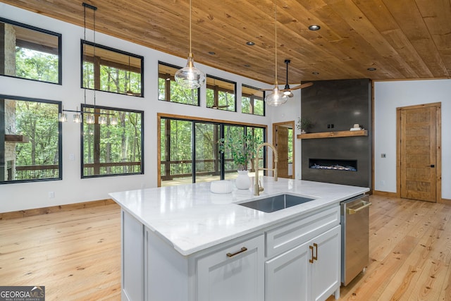 221 Goldmine Rd, Morganton, GA 30560 - kitchen featuring a sink, wooden ceiling, light wood-style flooring, decorative light fixtures, and white cabinetry