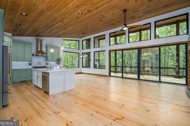 221 Goldmine Rd, Morganton, GA 30560 - kitchen with wall chimney exhaust hood, wood ceiling, light countertops, a ceiling fan, and light wood finished floors