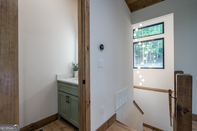 221 Goldmine Rd, Morganton, GA 30560 - bathroom with vanity, wood finished floors, and baseboards