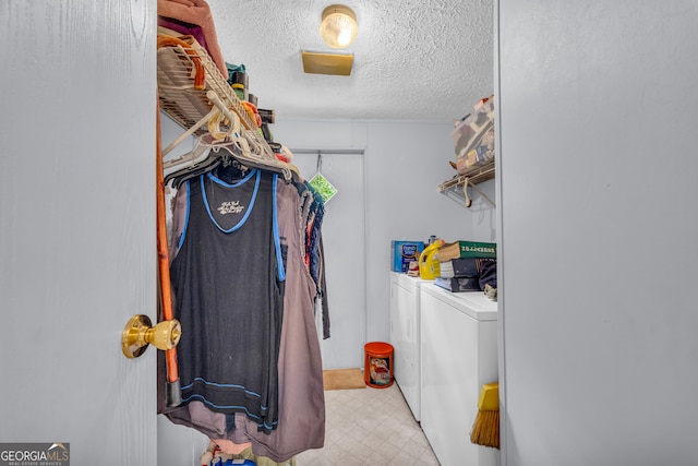 3085 Pea Ridge Rd, Cornelia, GA 30531 - laundry room with washer and dryer, a textured ceiling, and tile patterned floors