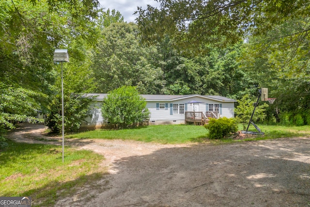 3085 Pea Ridge Rd, Cornelia, GA 30531 - view of front of property with dirt driveway, crawl space, and a wooden deck