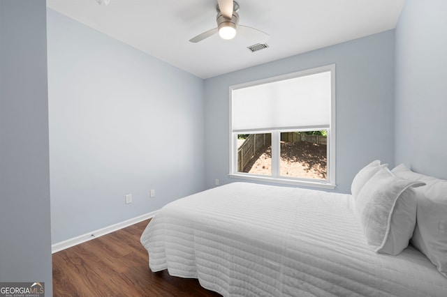 130 Bevington Ln, Woodstock, GA 30188 - bedroom with wood finished floors, baseboards, and ceiling fan