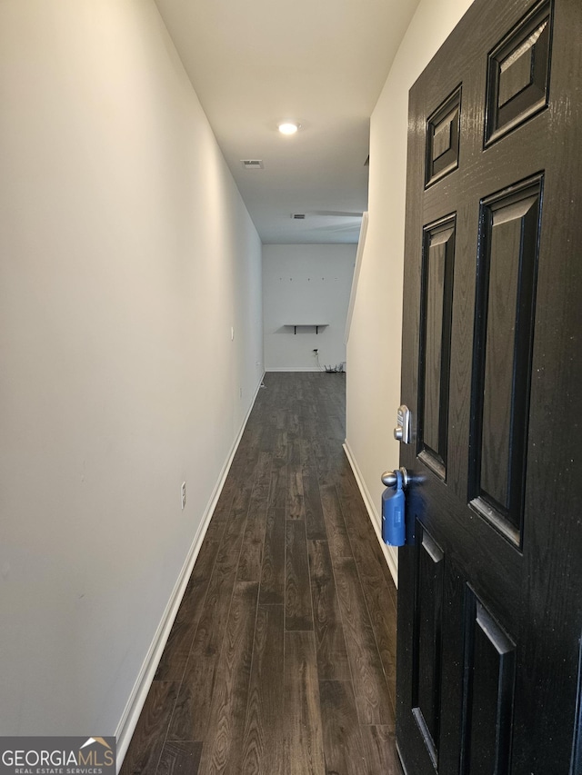 190 Hampton Cir, Mcdonough, GA 30253 - hall with dark wood-type flooring and baseboards