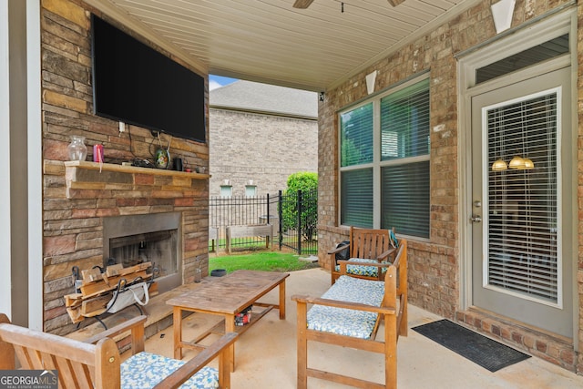 132 Shellbark Dr, Mcdonough, GA 30252 - view of patio / terrace featuring an outdoor stone fireplace and ceiling fan