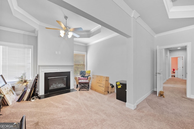 132 Shellbark Dr, Mcdonough, GA 30252 - living room featuring carpet, a fireplace with flush hearth, healthy amount of natural light, a ceiling fan, and ornamental molding