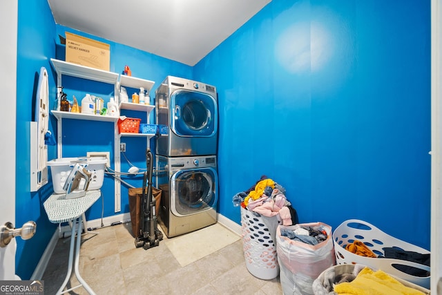 132 Shellbark Dr, Mcdonough, GA 30252 - washroom with stacked washer and clothes dryer and baseboards