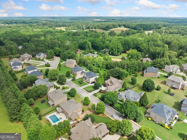 132 Shellbark Dr, Mcdonough, GA 30252 - aerial perspective of suburban area with a heavily wooded area