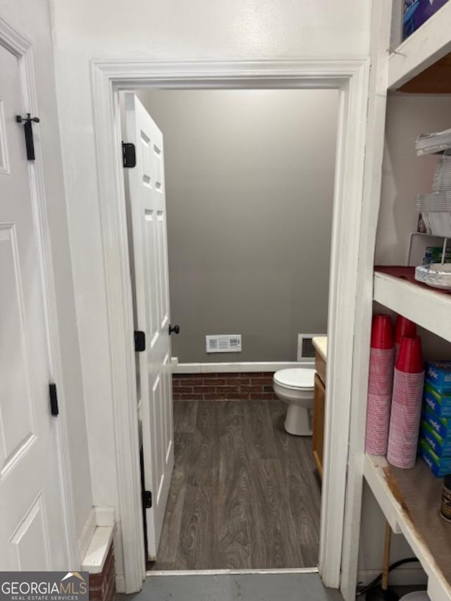 520 Campbell Rd, Cedartown, GA 30125 - bathroom featuring wood finished floors and toilet