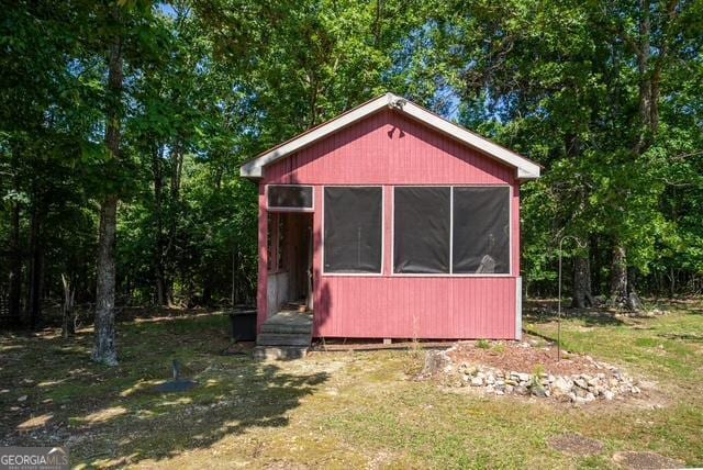 520 Campbell Rd, Cedartown, GA 30125 - view of outdoor structure featuring a sunroom