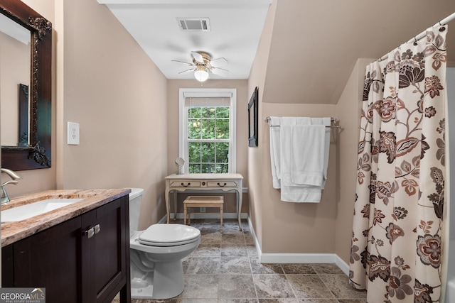 724 Fish Cove Rd, Blairsville, GA 30512 - full bath featuring baseboards, vanity, ceiling fan, toilet, and stone finish flooring