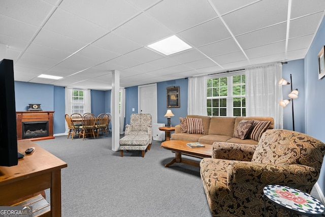 724 Fish Cove Rd, Blairsville, GA 30512 - living area with carpet floors, a drop ceiling, plenty of natural light, and a fireplace