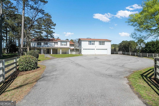 387 Colvin Dr, Locust Grove, GA 30248 - view of front facade featuring asphalt driveway