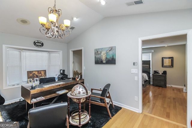 387 Colvin Dr, Locust Grove, GA 30248 - office with vaulted ceiling, light wood-style floors, a chandelier, and baseboards