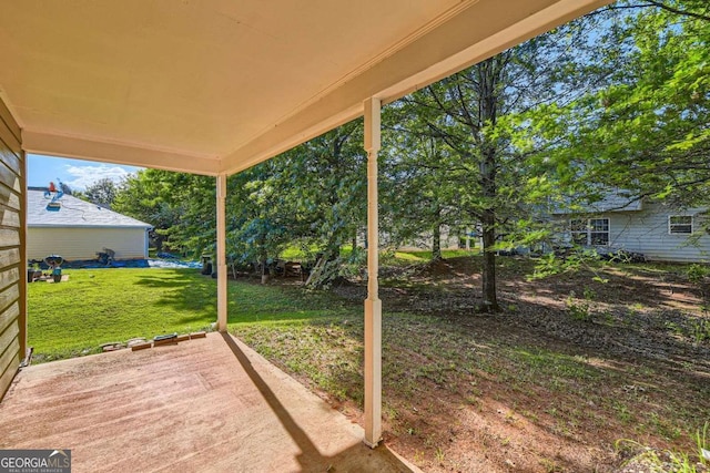 484 Cathedral Dr, Mcdonough, GA 30253 - view of green lawn featuring a patio