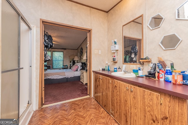 206 Briar Creek Way, Lizella, GA 31052 - bathroom with vanity, connected bathroom, a shower stall, and ornamental molding