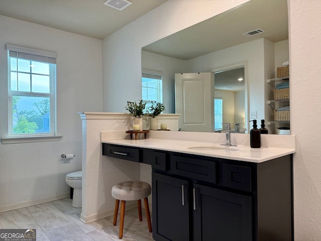 3836 Saddle Hill Way, Douglasville, GA 30135 - bathroom with vanity, toilet, baseboards, and marble finish floors