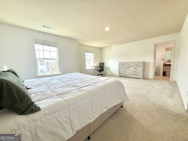 3836 Saddle Hill Way, Douglasville, GA 30135 - carpeted bedroom featuring a textured ceiling
