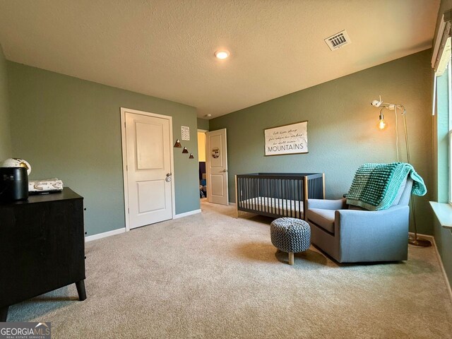 3836 Saddle Hill Way, Douglasville, GA 30135 - carpeted bedroom featuring baseboards and a textured ceiling