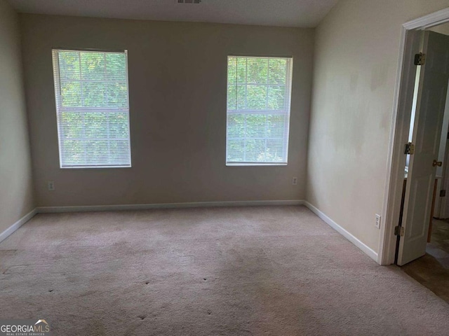 2858 Parkway Close, Lithonia, GA 30058 - unfurnished room featuring carpet floors and baseboards