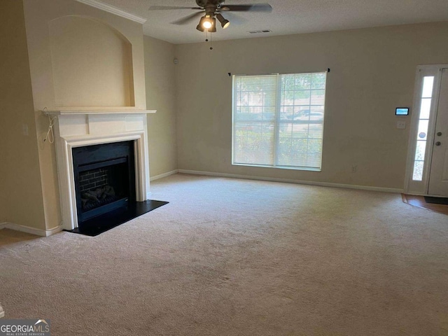 2858 Parkway Close, Lithonia, GA 30058 - unfurnished living room featuring ceiling fan, carpet flooring, a fireplace with flush hearth, and baseboards