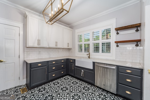 805 S Lee St, Fitzgerald, GA 31750 - kitchen featuring stainless steel dishwasher, white cabinets, crown molding, decorative backsplash, and a sink