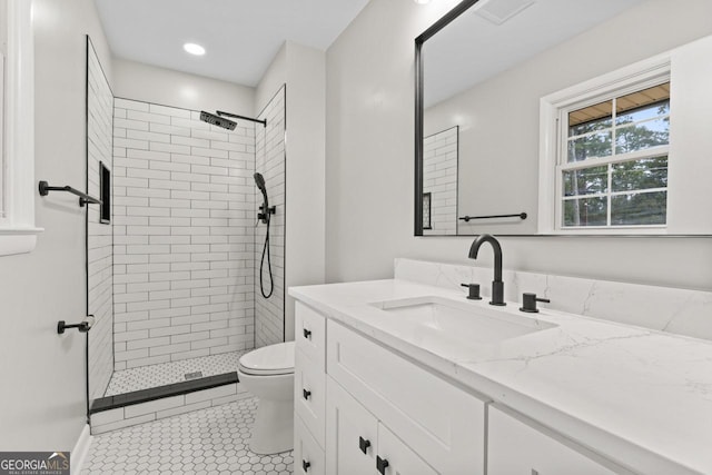 2002 Twin Falls Rd, Decatur, GA 30032 - full bath with toilet, vanity, tiled shower, tile patterned flooring, and recessed lighting