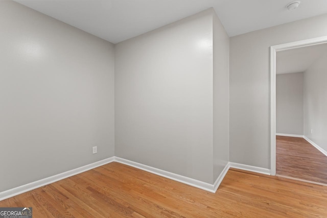 2002 Twin Falls Rd, Decatur, GA 30032 - unfurnished room with light wood-style flooring, baseboards, and a smoke detector