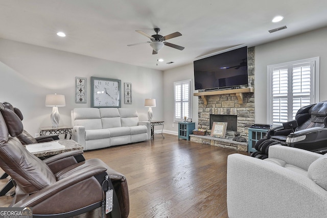 97 Senoya Ln, Senoia, GA 30276 - living area featuring a ceiling fan, a stone fireplace, wood finished floors, recessed lighting, and baseboards