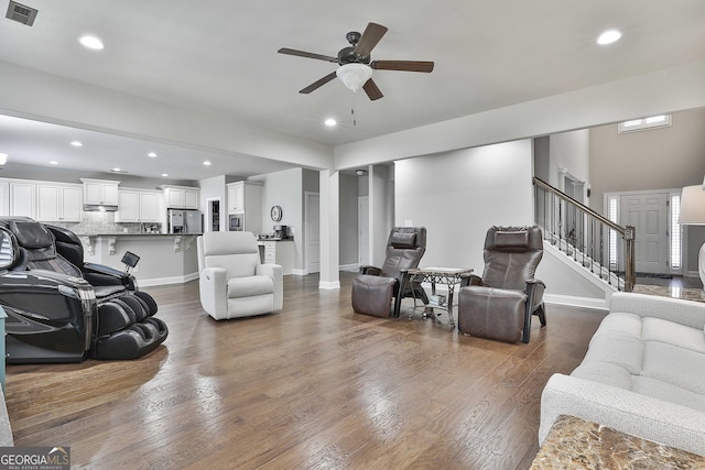 97 Senoya Ln, Senoia, GA 30276 - living area with ceiling fan, dark wood finished floors, recessed lighting, stairs, and baseboards