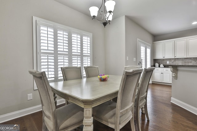 97 Senoya Ln, Senoia, GA 30276 - dining area with a chandelier, dark wood finished floors, and baseboards