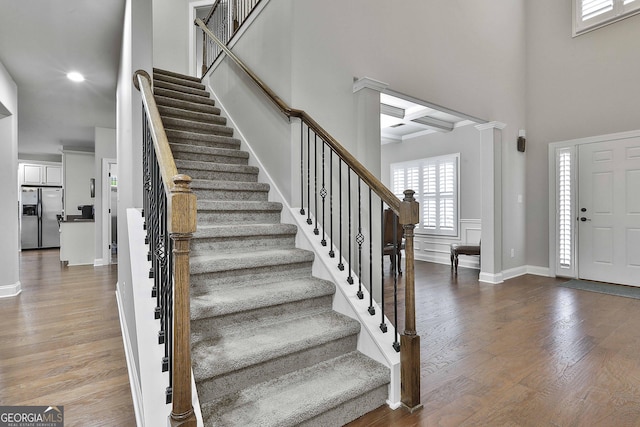 97 Senoya Ln, Senoia, GA 30276 - foyer entrance featuring a towering ceiling, stairs, wood finished floors, baseboards, and recessed lighting