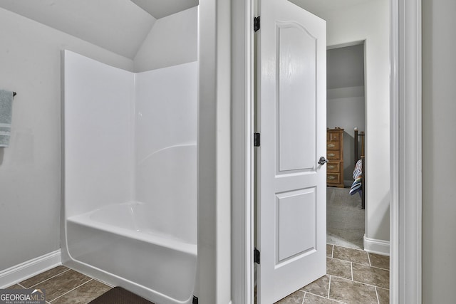97 Senoya Ln, Senoia, GA 30276 - full bath with lofted ceiling, baseboards, and tub / shower combination