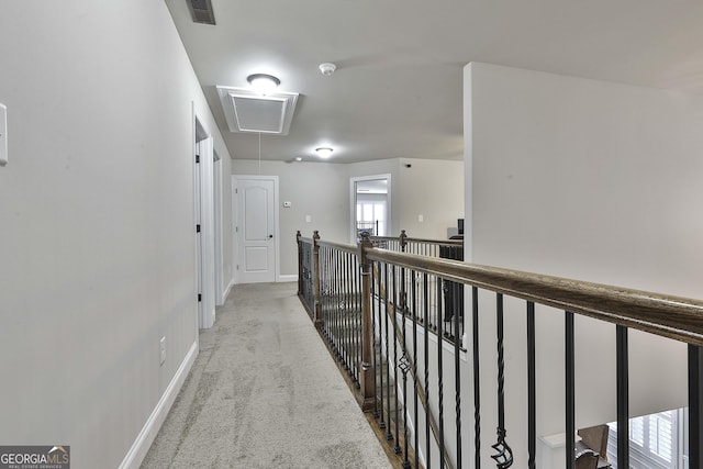 97 Senoya Ln, Senoia, GA 30276 - hallway featuring attic access, carpet flooring, and baseboards