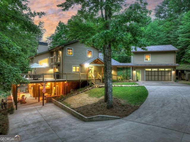 123 Old Fjord Rd, Blue Ridge, GA 30513 - view of front of home with driveway, a garage, and a chimney