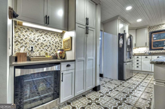 123 Old Fjord Rd, Blue Ridge, GA 30513 - kitchen featuring stainless steel refrigerator with ice dispenser, wine cooler, tasteful backsplash, recessed lighting, and dark countertops
